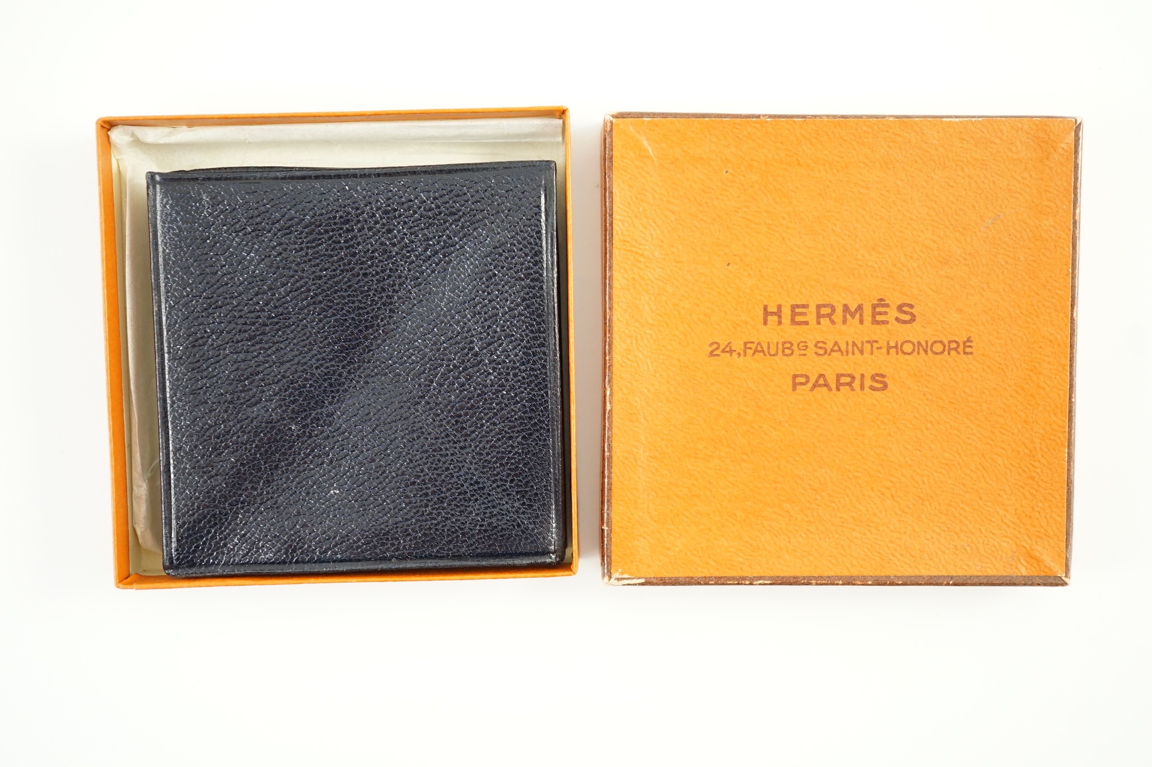 A boxed vintage Hermes blue leather purse, 7 cm.